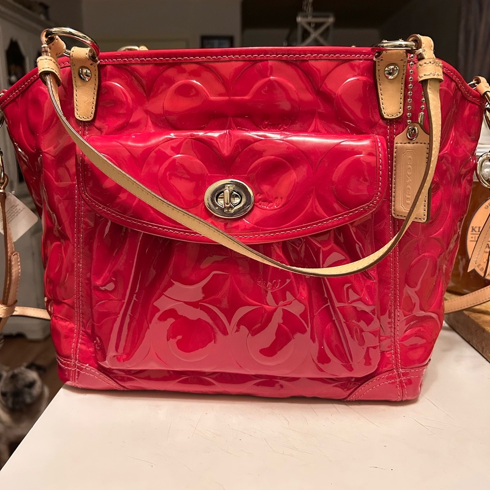 Coach Red Shoulder Bag with Glossy Finish and Structured Design